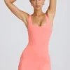 Robe de tennis Soft Active à dos nu, couleur corail Robe de tennis Soft Active à dos nu, couleur corail
