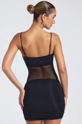 Robe Eislyn à empiècements transparents et fronces, en noir