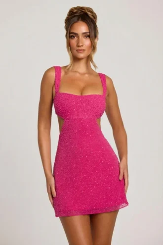 Robe Emilion à découpes ornées, couleur fuchsia