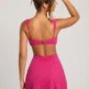Robe Emilion à découpes ornées, couleur fuchsia Robe Emilion à découpes ornées, couleur fuchsia