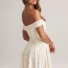 Robe Jaida en modal à épaules dénudées et coupe trapèze, imprimé floral Robe Jaida en modal à épaules dénudées et coupe trapèze, imprimé floral