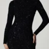Robe Leonie à dos nu orné de paillettes, en noir Robe Leonie à dos nu orné de paillettes, en noir