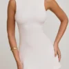 Robe Lidia à col haut et dos nu, en blanc Robe Lidia à col haut et dos nu, en blanc