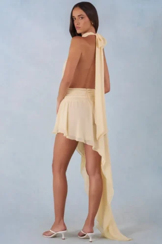 Robe longue asymétrique à dos nu Mariselle, imprimé fleurs jaunes