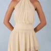 Robe longue asymétrique à dos nu Mariselle, imprimé fleurs jaunes Robe longue asymétrique à dos nu Mariselle, imprimé fleurs jaunes