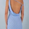 Robe longue asymétrique Nivara à imprimé pois bleus Robe longue asymétrique Nivara à imprimé pois bleus