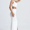Robe longue asymétrique Rosalia avec détails métalliques, en blanc Robe longue asymétrique Rosalia avec détails métalliques, en blanc