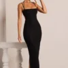 Robe longue à col bénitier ornée Monte Carlo en noir Robe longue à col bénitier ornée Monte Carlo en noir