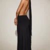 Robe longue dos nu à col licou en jersey souple Merryth, couleur noir Robe longue dos nu à col licou en jersey souple Merryth, couleur noir