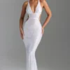 Robe longue dos nu à découpes et ornements Magdalena, blanche Robe longue dos nu à découpes et ornements Magdalena, blanche