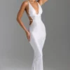 Robe longue dos nu à découpes et ornements Magdalena, blanche Robe longue dos nu à découpes et ornements Magdalena, blanche