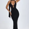 Robe longue à dos nu et découpes avec détail foulard Anneka, en noir Robe longue à dos nu et découpes avec détail foulard Anneka, en noir
