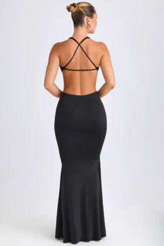 Robe longue à dos nu et découpes avec détails métalliques Omarosa, en noir
