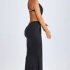 Robe longue à dos nu et découpes avec détails métalliques Omarosa, en noir Robe longue à dos nu et découpes avec détails métalliques Omarosa, en noir