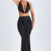 Robe longue à dos nu et découpes avec détails métalliques Omarosa, en noir Robe longue à dos nu et découpes avec détails métalliques Omarosa, en noir