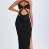 Robe longue à dos nu et découpes Bethania, détails métalliques, en noir Robe longue à dos nu et découpes Bethania, détails métalliques, en noir