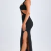 Robe longue à dos nu et découpes Bethania, détails métalliques, en noir Robe longue à dos nu et découpes Bethania, détails métalliques, en noir