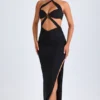 Robe longue à dos nu et découpes Bethania, détails métalliques, en noir Robe longue à dos nu et découpes Bethania, détails métalliques, en noir
