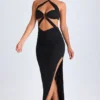 Robe longue à dos nu et découpes Bethania, détails métalliques, en noir Robe longue à dos nu et découpes Bethania, détails métalliques, en noir