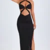 Robe longue à dos nu et découpes Bethania, détails métalliques, en noir Robe longue à dos nu et découpes Bethania, détails métalliques, en noir