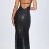 Robe longue à dos nu et découpes ornées Joella, en noir Robe longue à dos nu et découpes ornées Joella, en noir