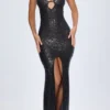 Robe longue à dos nu et découpes ornées Joella, en noir Robe longue à dos nu et découpes ornées Joella, en noir