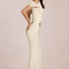 Robe longue drapée asymétrique Calisse en ivoire Robe longue drapée asymétrique Calisse en ivoire