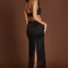 Robe longue à franges et décolleté plongeant Solferina, couleur noire Robe longue à franges et décolleté plongeant Solferina, couleur noire