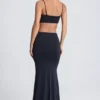 Robe longue Julitta à découpes et détails métalliques, en noir Robe longue Julitta à découpes et détails métalliques, en noir