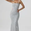 Robe longue Katalia à découpes et ornements, couleur argent Robe longue Katalia à découpes et ornements, couleur argent