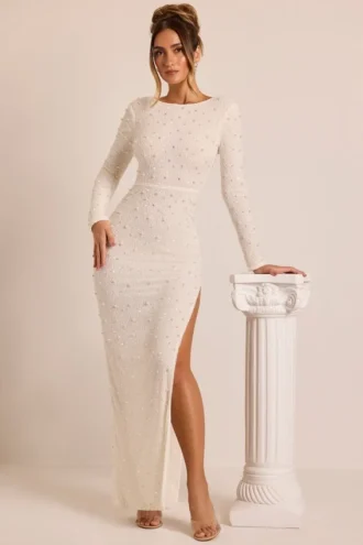 Robe longue à manches longues et dos nu Vienna, ornée de paillettes, en blanc