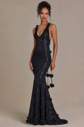 Robe longue noire à décolleté plongeant et dos nu, ornée de paillettes