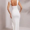 Robe longue Sloane à décolleté plongeant et fente haute, en blanc Robe longue Sloane à décolleté plongeant et fente haute, en blanc