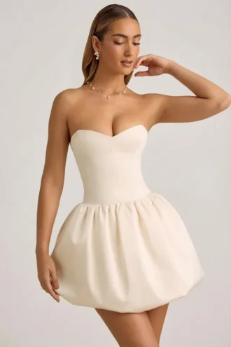 Robe mi-longue convertible Gloriana à nœud et ourlet bouffant, couleur ivoire
