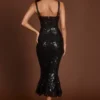 Robe mi-longue corsetée Raffaella avec découpes, en zèbre noir Robe mi-longue corsetée Raffaella avec découpes, en zèbre noir