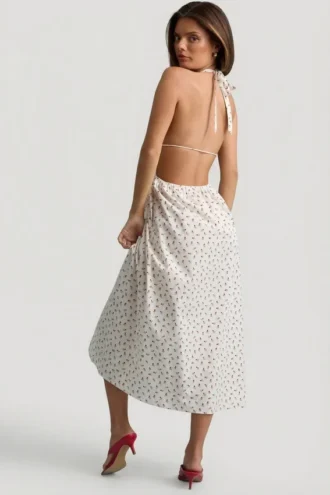 Robe mi-longue en popeline de coton Aeris dos nu à imprimé roses Robe mi-longue en popeline de coton Aeris dos nu à imprimé roses