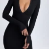 Robe mi-longue à encolure en V plongeante Yael en modal noir Robe mi-longue à encolure en V plongeante Yael en modal noir