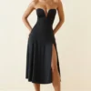 Robe mi-longue sans bretelles en jersey fluide Joely, coupe trapèze, couleur noir Robe mi-longue sans bretelles en jersey fluide Joely, coupe trapèze, couleur noir