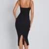 Robe mi-longue à volants en modal Nora, couleur noire Robe mi-longue à volants en modal Nora, couleur noire