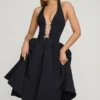 Robe midi Angelina à nœud et dos nu, en noir Robe midi Angelina à nœud et dos nu, en noir