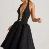 Robe midi Angelina à nœud et dos nu, en noir Robe midi Angelina à nœud et dos nu, en noir