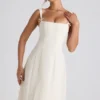Robe midi plissée évasée Isadora avec nœud, couleur ivoire Robe midi plissée évasée Isadora avec nœud, couleur ivoire