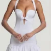 Robe Millie à nœud et ourlet bouffant, dos nu, en blanc Robe Millie à nœud et ourlet bouffant, dos nu, en blanc