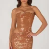 Robe Rania à découpes et ornements, couleur bronze Robe Rania à découpes et ornements, couleur bronze
