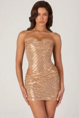 Robe Rania à découpes et ornements dorés
