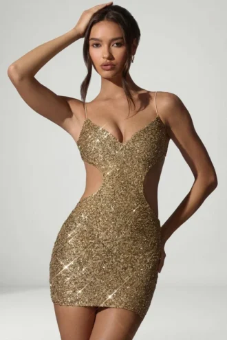 Robe Sayzel à découpes et ornements dorés
