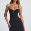 Robe trapèze Deia avec détails métalliques, en noir Robe trapèze Deia avec détails métalliques, en noir