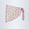 Sarong Molinas à nouer sur le côté, imprimé floral rouge Sarong Molinas à nouer sur le côté, imprimé floral rouge