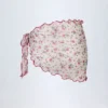 Sarong Molinas à nouer sur le côté, imprimé floral rouge Sarong Molinas à nouer sur le côté, imprimé floral rouge
