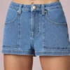 Short Beata à taille haute et coupe trapèze, délavage bleu moyen Short Beata à taille haute et coupe trapèze, délavage bleu moyen